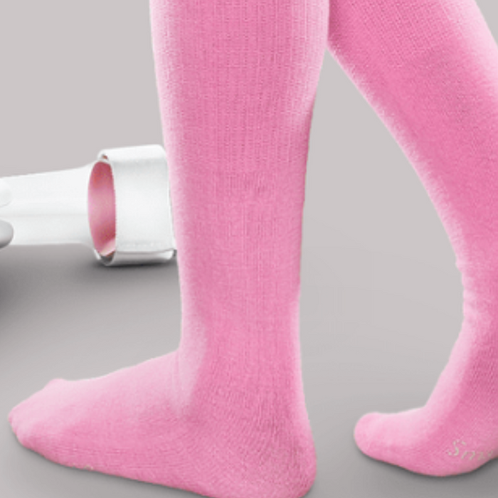 Legs wearing pink speciality socks and an AFO in the background