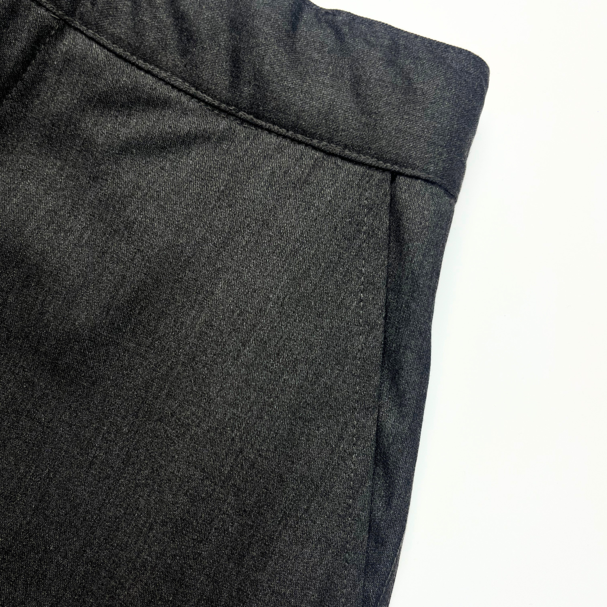 Close up of pocket detail on charcoal school trousers
