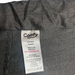 Close up of clothing tag in trousers. Tag is removable