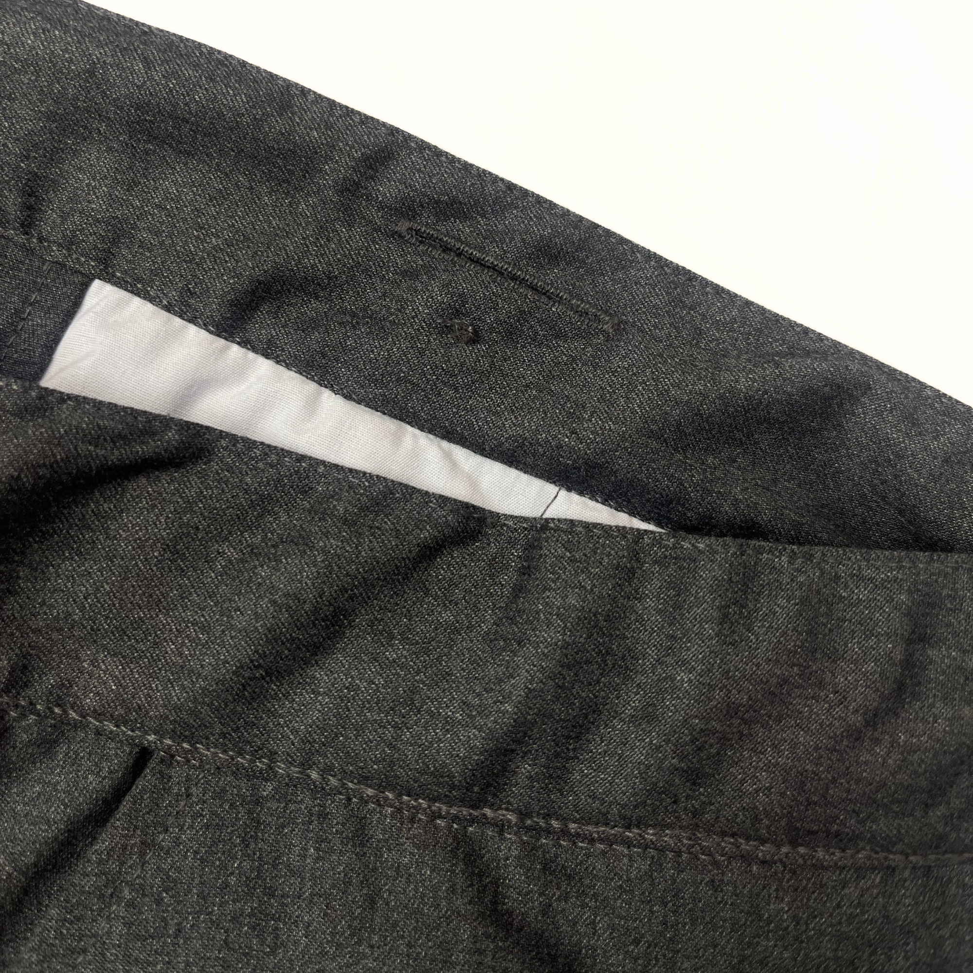Close up of inner waistband of school trousers. Showing the internal sensory-friendly hidden waist adjuster