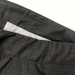 Close up of inner waistband of school trousers. Showing the internal sensory-friendly hidden waist adjuster